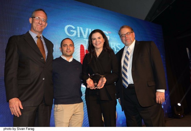Tal Laufer GM of Spectronix/Emerson receives the Award